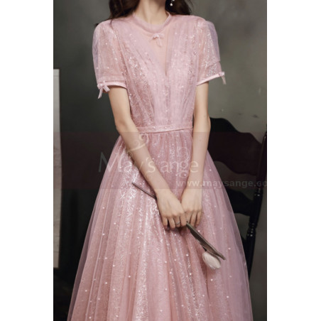 Robe de soirée rose pailleté avec dos stylé et manches noués