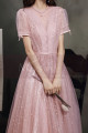 Robe de soirée rose pailleté avec dos stylé et manches noués - Ref L2369 - 02
