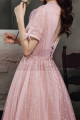 Robe de soirée rose pailleté avec dos stylé et manches noués - Ref L2369 - 04