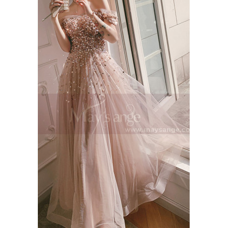 Nude pink tulle maxi prom dress with modern rhinestone top and dropped short sleeves
