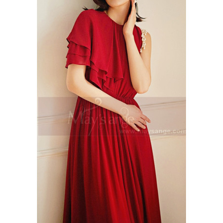 Long evening dress in raspberry chiffon with flounced sleeves on one side