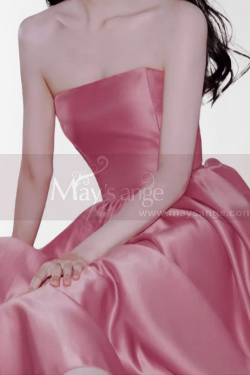 Red satin evening dress with double V neckline and small decorations on