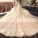 robe de mariée bohème ivoire champagne pâle romantique dentelle et tulle foisonne - Ref M393 - 05
