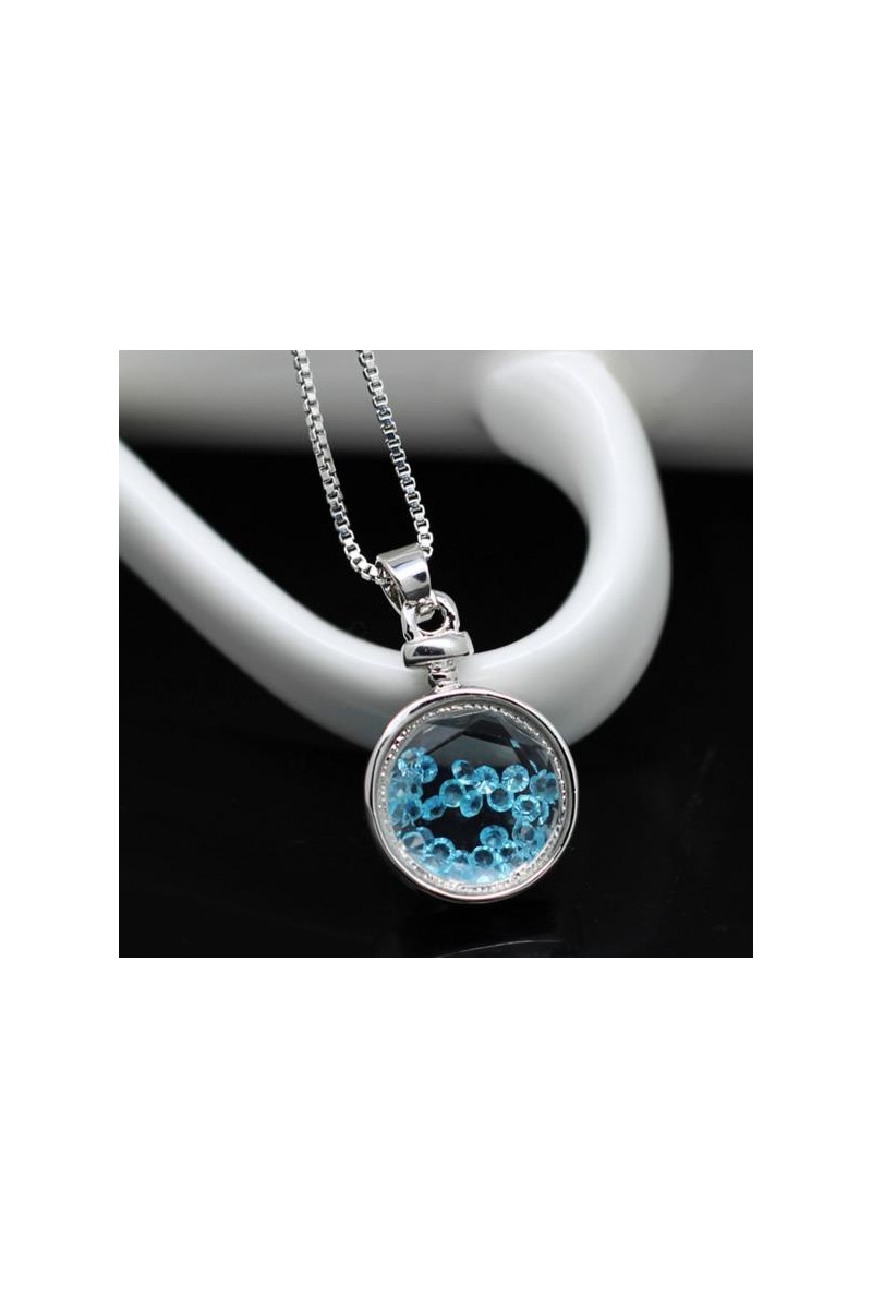 Pendentif rond argent avec cristal bleu - Ref F071 - 01